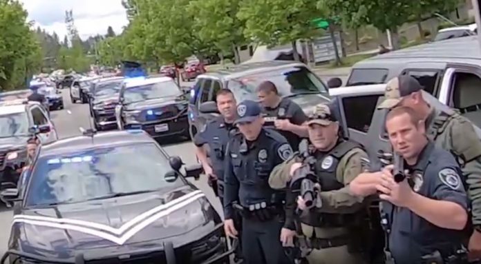 patriot-front-protesters-release-bodycam-video-of-their-arrest–-police-and-feds-sent-a-minimum-of-10-vehicles-and-pulled-guns-out-to-arrest-31-unarmed-protesters