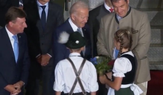 joe-biden-sets-his-sights-on-little-girl-as-quickly-as-he-arrives-in-germany-(video)