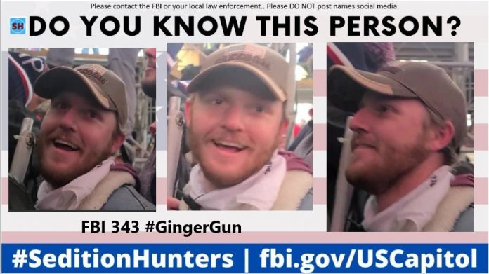 establishing:-luke-robinson,-aka-#gingergun,-was-only-protester-filmed-with-a-gun-on-jan.-6,-the-fbi-later-removed-him-from-their-most-wanted-list–-was-also-accused-of-wearing-an-earpiece