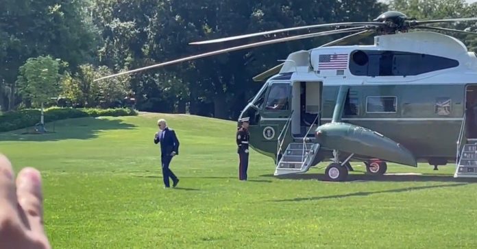 a-masked-joe-biden-returns-to-white-house-from-extended-vacation-(video)