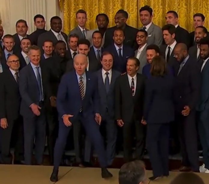 enjoy:-things-get-really-weird-when-biden-drops-to-one-knee-in-front-of-kamala-harris-for-photo-with-golden-state-warriors