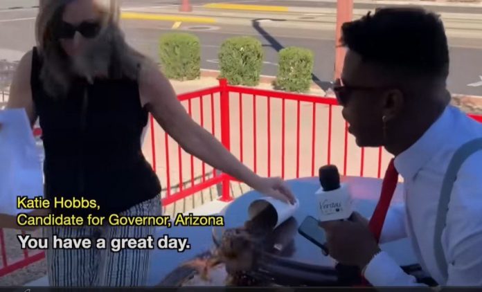 arizona-gov.-katie-hobbs-poses-with-fake-black-activist-rachel-dolezal-as-she-signs-eo-prohibiting-race-based-hair-discrimination-while-gas-nears-$5/gallon-and-border-remains-wide-open