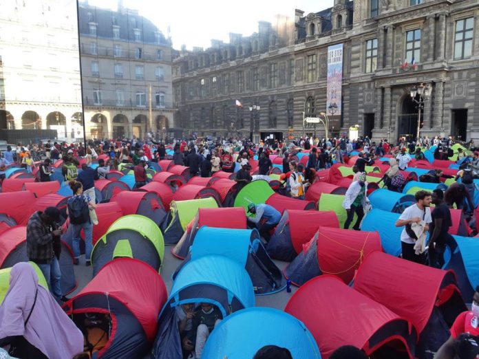 entitled-illegal-aliens-set-up-an-occupy-style-camp-at-palais-royal-in-paris-with-ngo-assistance-demanding-free-housing–-police-respond-(video)