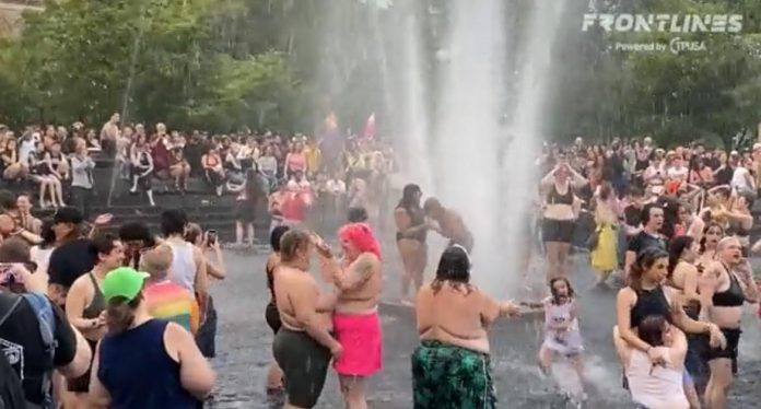 topless-women-dance-and-play-with-children-at-pride-event-water-party-in-new-york-city-(video)
