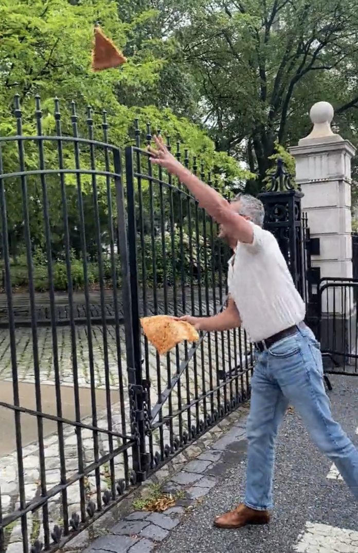 conservative-artist-summoned-for-throwing-pizza-at-ny-city-hall-in-protest-of-democrat-crackdown-on-wood-fired-pizza-to-combat-climate-change(-video)