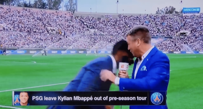 espn-fc-commentator-shaka-hislop-collapses-on-live-television-during-real-madrid-vs.-air-conditioning-milan-friendly-match-(video)