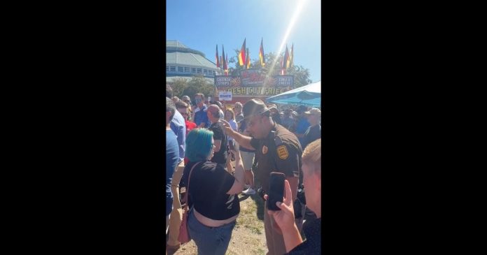 enjoy:-blue-haired-punk-gets-rude-awakening-from-police-after-attacking-desantis-supporter