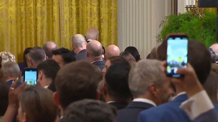 joe-biden-slowly-sneaks-out-the-side-door-to-avoid-taking-questions-from-reporters-(video)