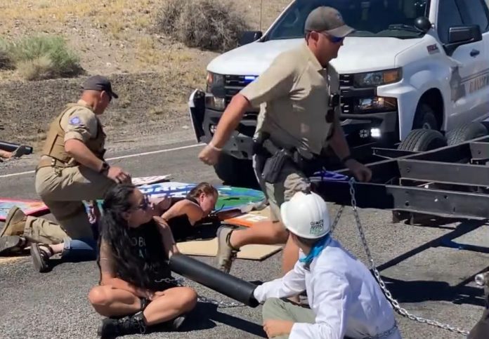 nevada-rangers-ram-through-climate-protest-blockade,-point-gun-at-activists,-slam-them-to-the-ground-(video)