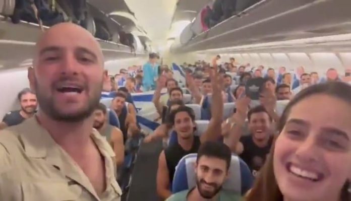 motivating:-plane-of-young-adults-from-peru-touches-down-in-israel-filled-with-young-men-and-women-ready-to-serve-israeli-army-in-war-against-hamas