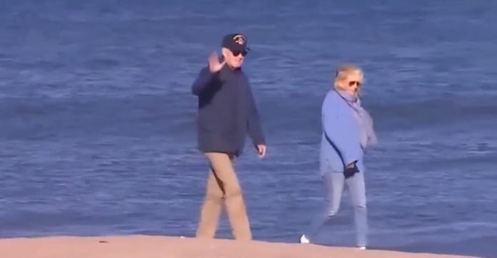 joe-biden-shuffles-along-the-beach,-callously-ignores-questions-about-americans-held-hostage-by-hamas-(video)