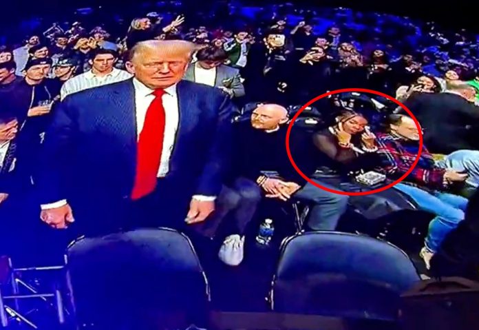 as-crowd-roars-in-appreciation–-comedian-bill-burr’s-angry-wife-flips-off-president-trump-at-ufc-event-(video)