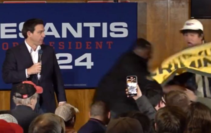 see:-security-tackles-protester-at-desantis-campaign-event-in-iowa