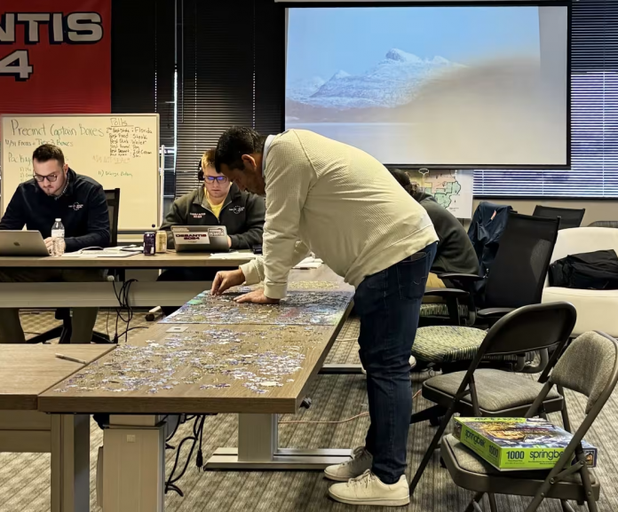 week-before-iowa-caucuses,-newly-appointed-ceo-of-‘never-back-down,’-desantis-aligned-super-pac,-spends-time-in-office-working-on-a-jigsaw-puzzle