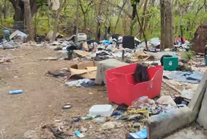 homeless-camps-in-austin,-texas-leaving-behind-mountains-of-garbage-in-popular-green-space-by-creek-(video)