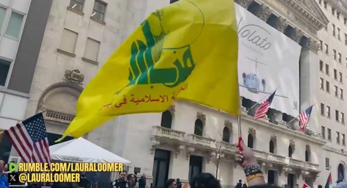 hezbollah-flags-wave-at-terrorist-rally-in-nyc,-protestors-assault-american-flag-waving-counter-protester-and-burn-american-flag-screaming-“death-to-america”