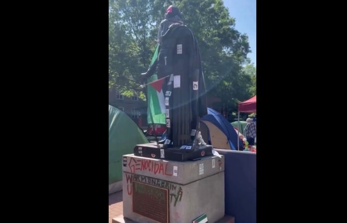 pro-gaza-protesters-vandalize-gw-university-campus,-desecrate-george-washington-statue-with-anti-american-graffiti–-video