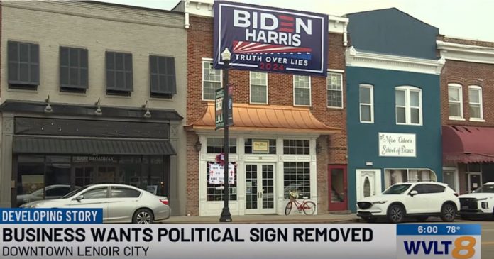 woman-horrified-by-what-happened-after-building-owners-unfurl-biden-harris-banner-right-above-her-store