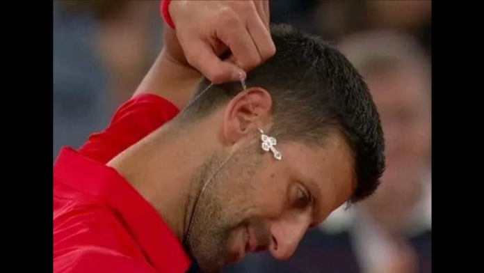 novak-djokovic-proudly-displays-his-christian-cross-at-paris-olympics