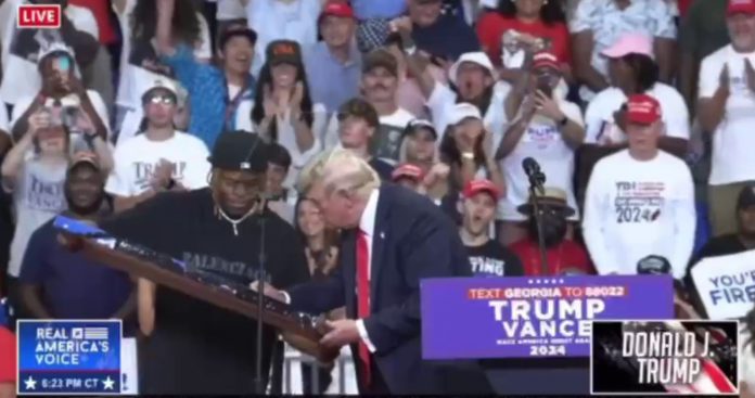 man-of-the-people:-president-trump-signs-black-artist’s-portrait-of-him-surviving-assassination-attempt-(video)