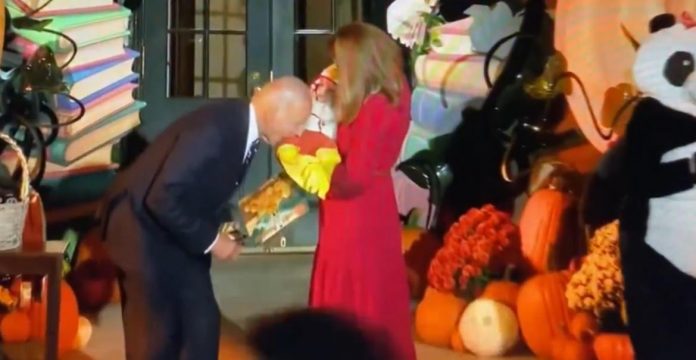 wth?!-joe-biden-bites-baby-dressed-as-a-chicken-at-white-house-halloween-celebration-(video)