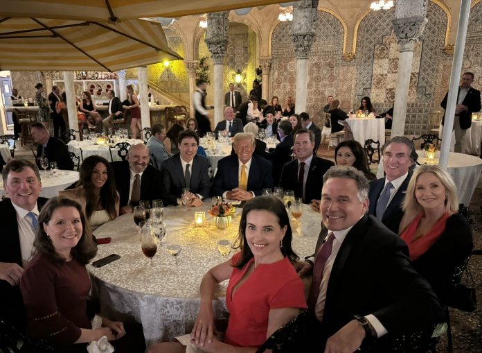 globalist-poster-boy-justin-trudeau-pictured-having-dinner-with-trump-at-mar-a-lago-—-but-the-internet-explodes-over-this-unexpected-photobomb