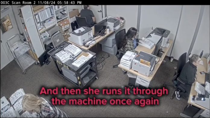 caught-on-video:-orange-county,-ca-election-worker-repeatedly-scans-huge-stack-of-ballots-three-times-—-election-official-responds