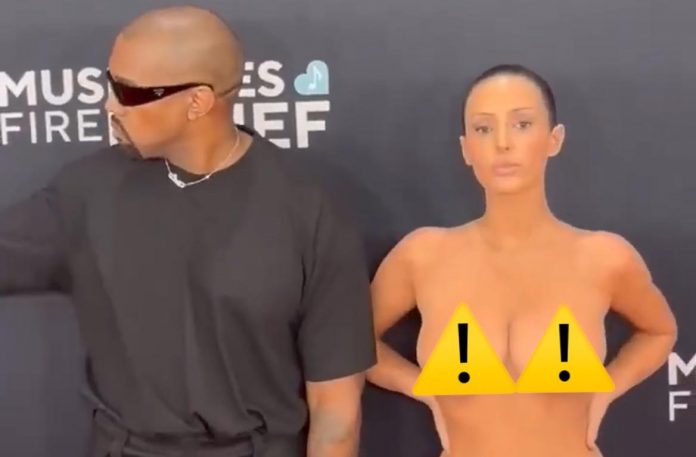 kanye-“ye”-west’s-wife-shocks-onlookers,-shows-up-to-grammys-red-carpet-completely-nude-(video)-–-update:-they-got-kicked-out!